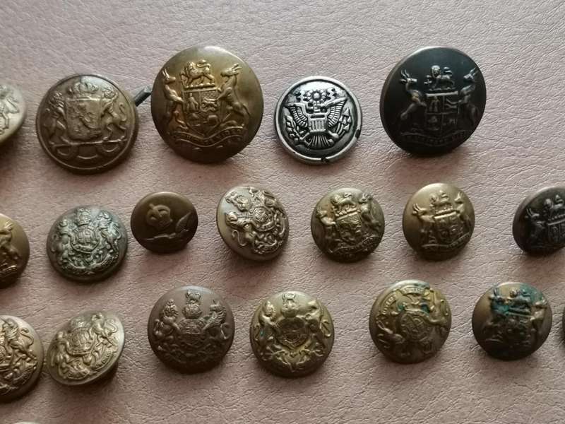 27 brass military buttons