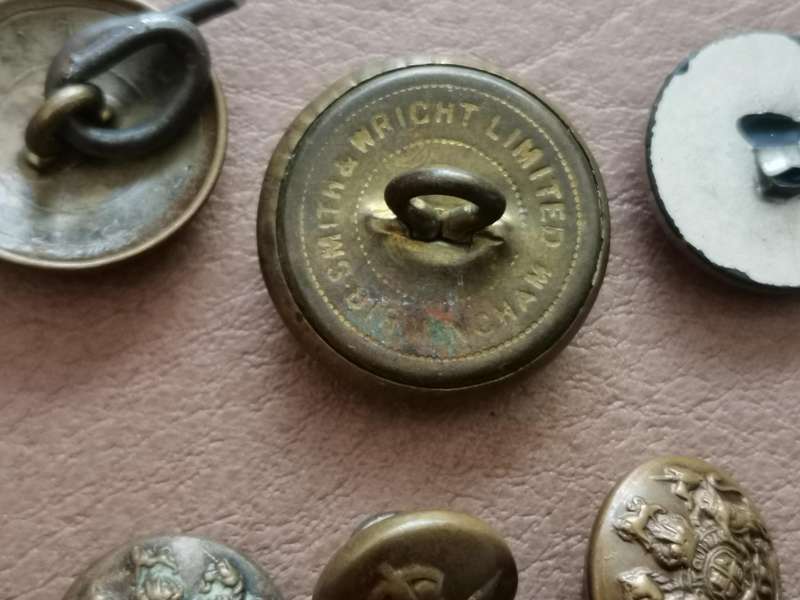 27 brass military buttons
