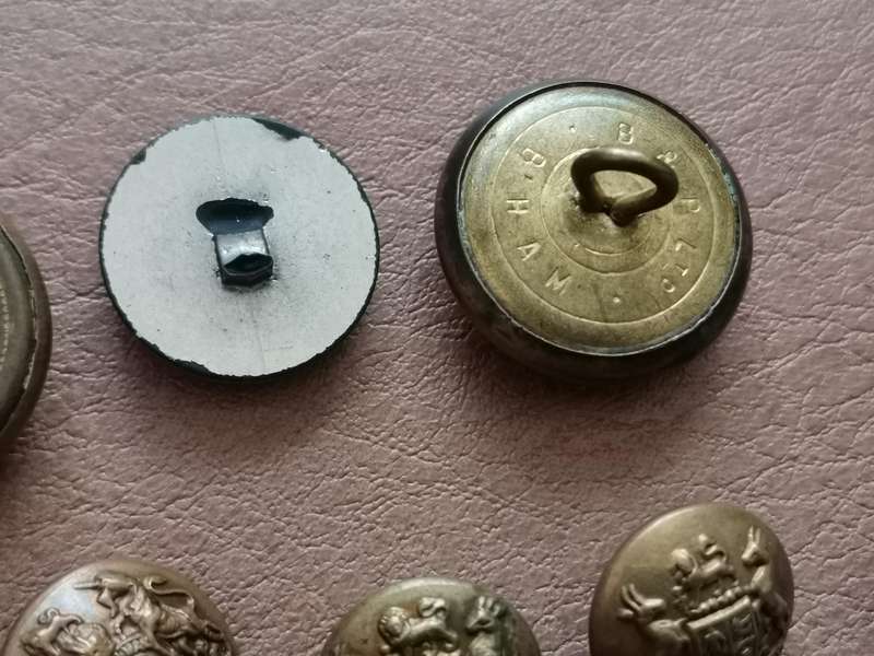 27 brass military buttons