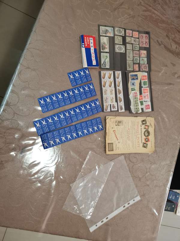 Very old stamp catalog and stamps