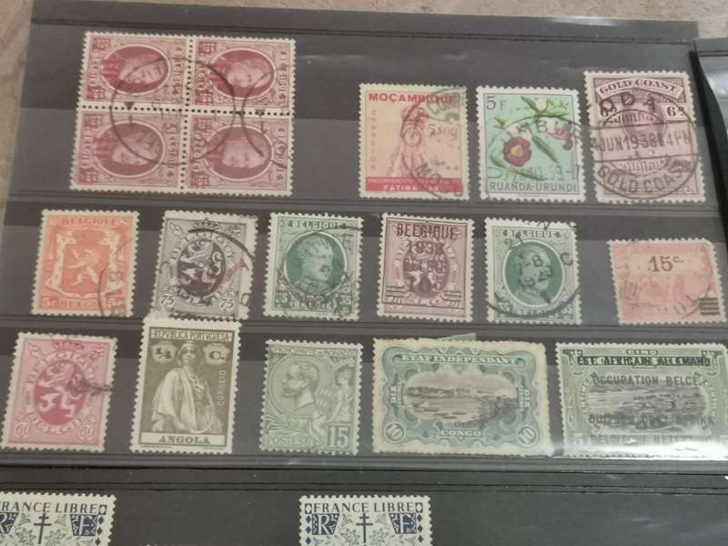 Very old stamp catalog and stamps