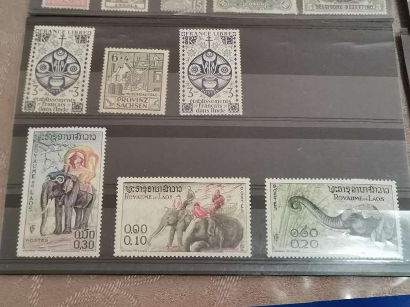 Very old stamp catalog and stamps