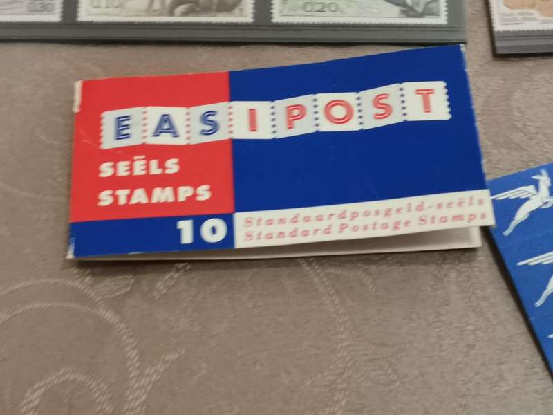 Very old stamp catalog and stamps