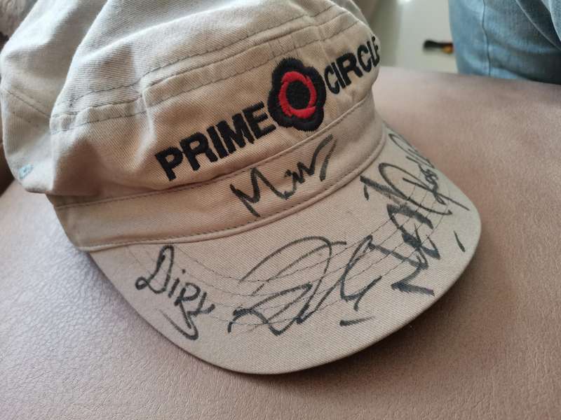 Prime circle Cap autographed by the Band