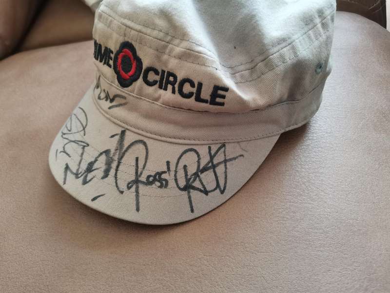 Prime circle Cap autographed by the Band