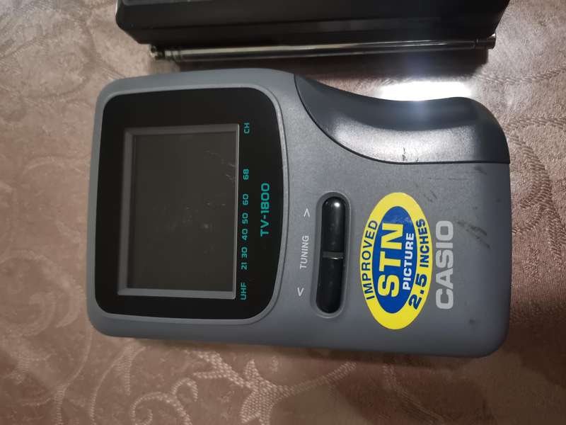 Two vintage casio portable / handheld TV sets