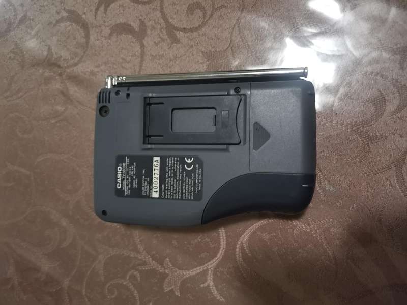 Two vintage casio portable / handheld TV sets