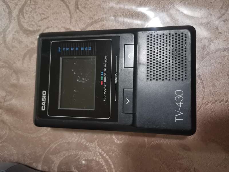 Two vintage casio portable / handheld TV sets