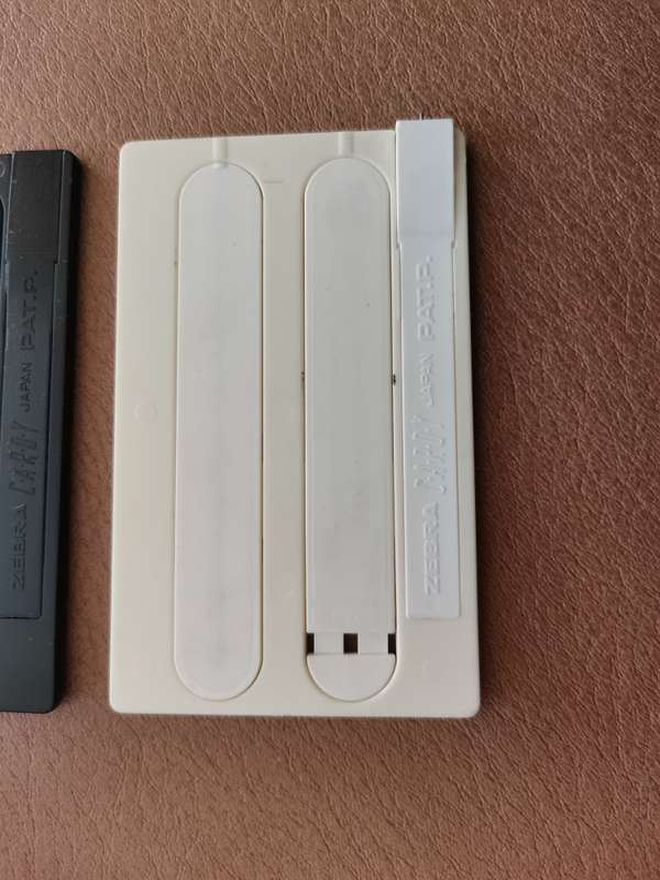 A rare pair of Cardy csb - 1000 zebra wallet pen and pencils sets