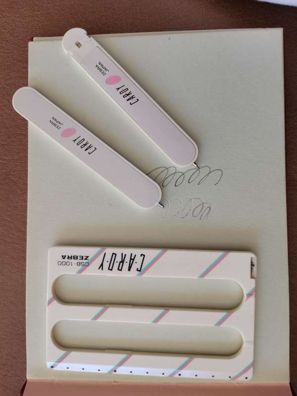 A rare pair of Cardy csb - 1000 zebra wallet pen and pencils sets