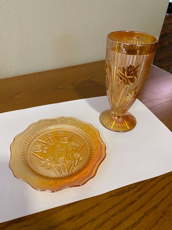 Carnival glass "Iris and herringbone" pedestal tumbler and saucer