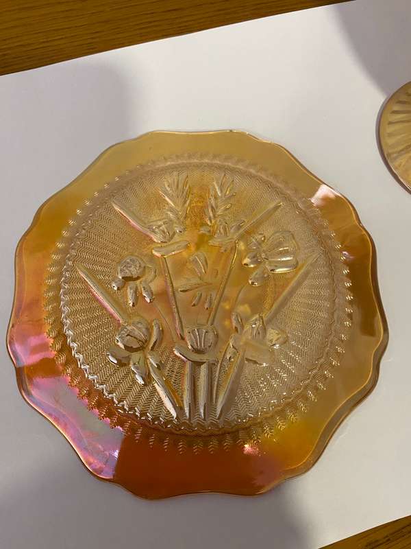 Carnival glass "Iris and herringbone" pedestal tumbler and saucer
