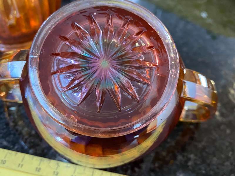 Antique carnival glass sugar bowl and creamer