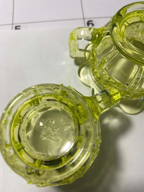 Vaseline glass creamer and sugar bowl with lid