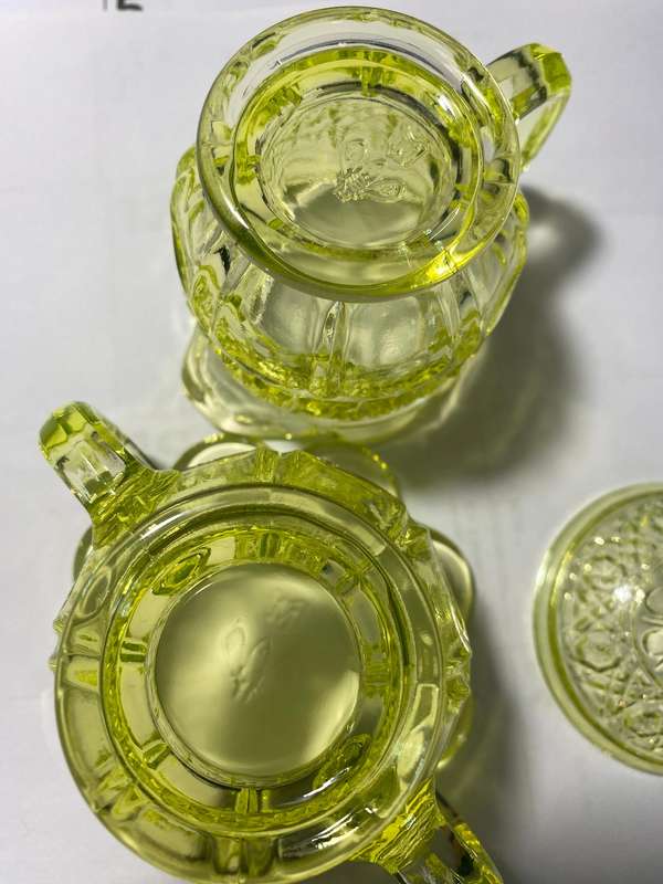 Vaseline glass creamer and sugar bowl with lid