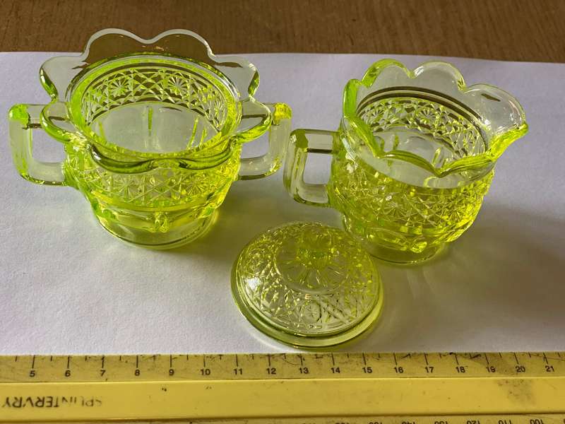 Vaseline glass creamer and sugar bowl with lid