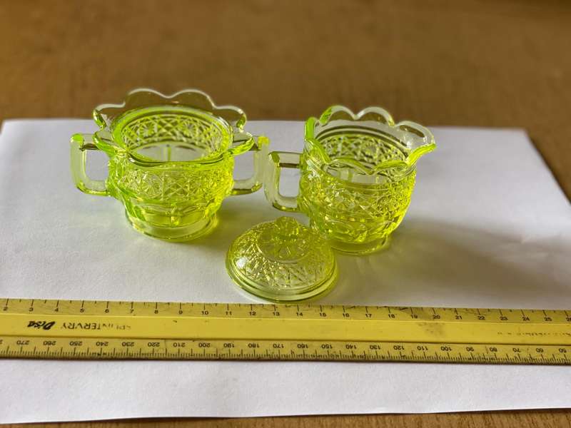Vaseline glass creamer and sugar bowl with lid