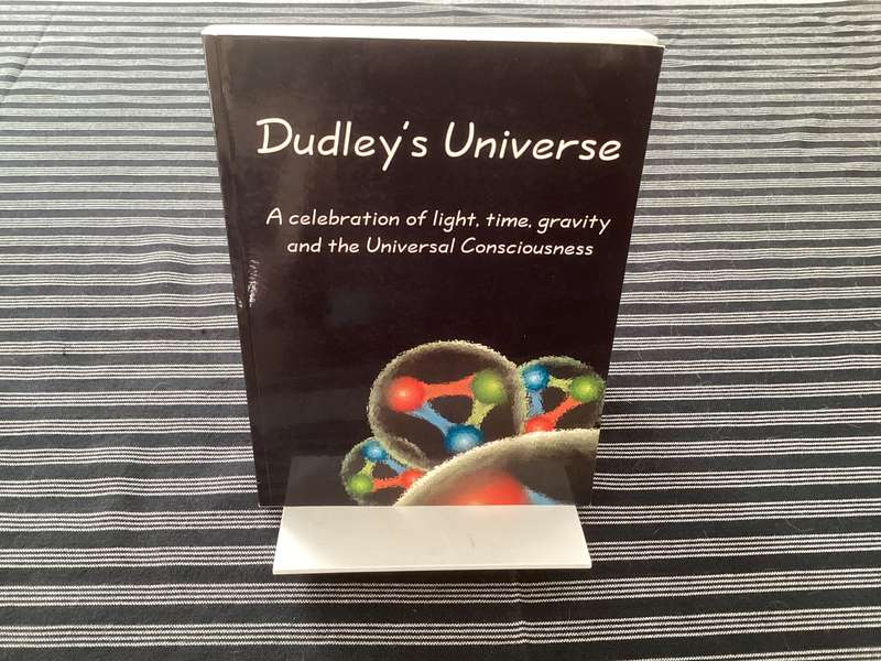 DUDLEYS UNIVERSE, A celebration of light, time, gravity and the universal consciousness. Softcover.