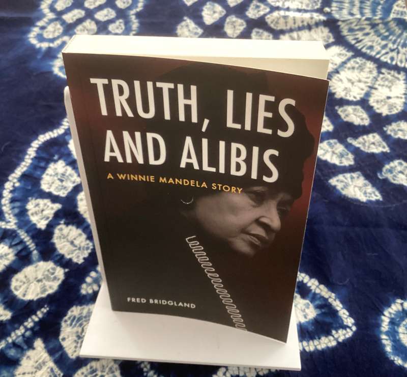 TRUTH, LIES AND ALIBIS. A Winnie Mandela Story, by Fred Bridgland. Softcover in an unread condition.