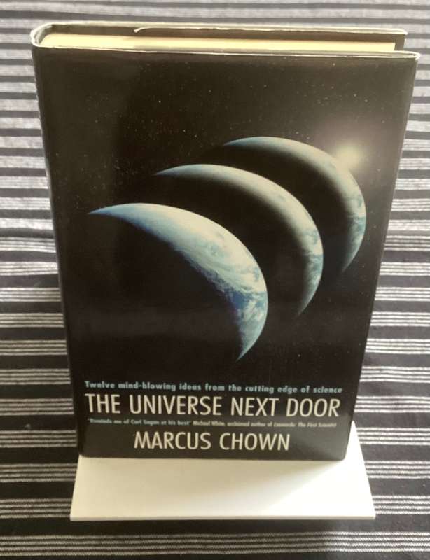 The Universe Next Door, by Marcus Chown. Hardcover, V Good condition.
