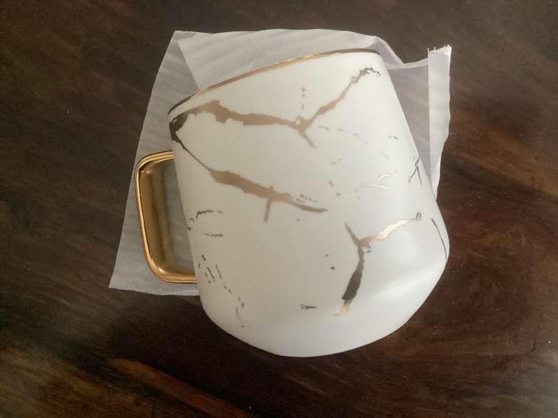 Kintsukuroi, fine bone China mug, with acacia wooden base. New.