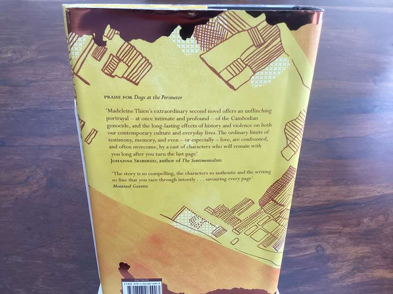 DOGS at the PERIMETER, by Madeleine Thien. Hardcover, in a new condition.