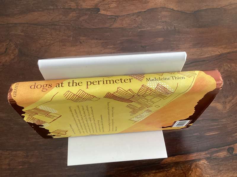 DOGS at the PERIMETER, by Madeleine Thien. Hardcover, in a new condition.