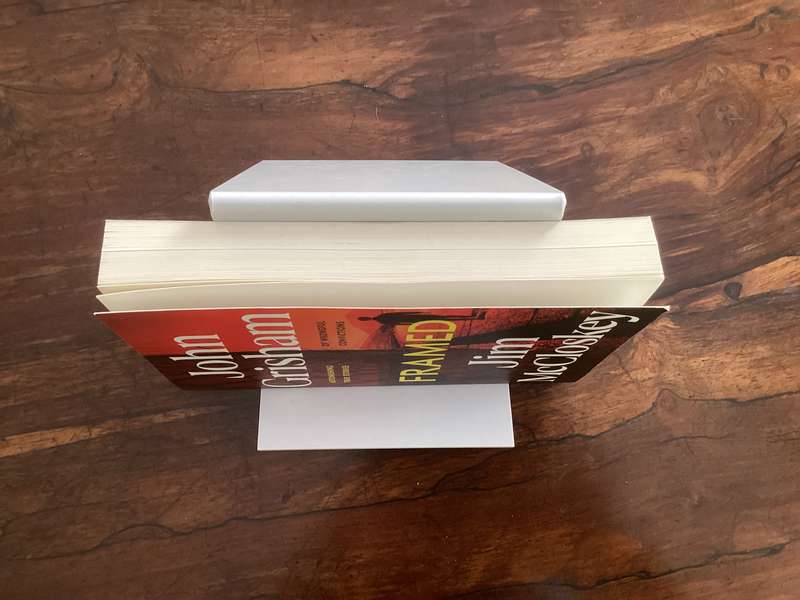 FRAMED by John Grisham and Jim McCloskey. Large 1st print paperback, in excellent condition.