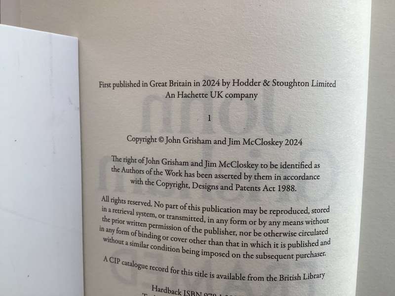 FRAMED by John Grisham and Jim McCloskey. Large 1st print paperback, in excellent condition.