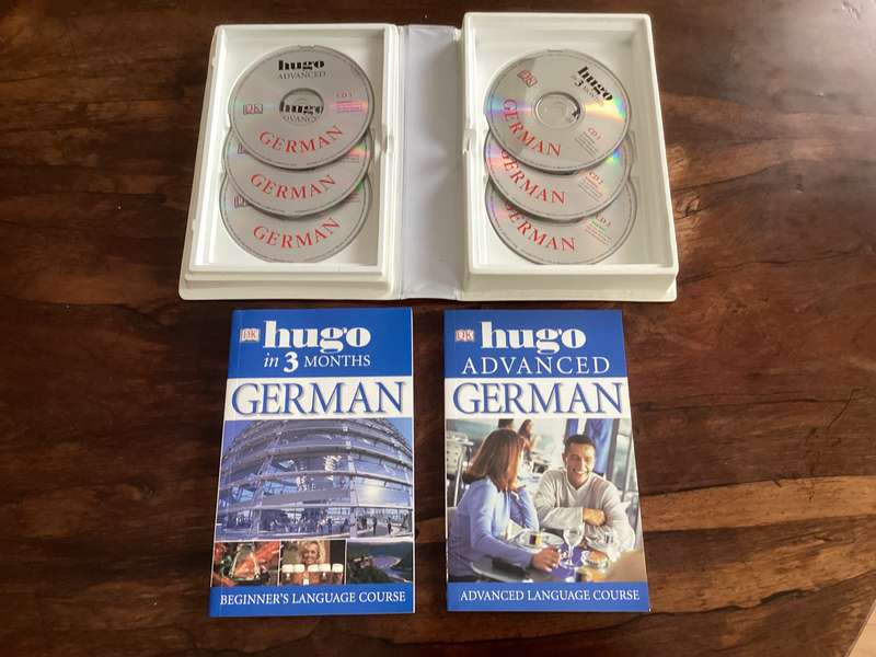 GERMAN LANGUAGE COURSE, Complete Hugo, by DK. TWO BOOKLETS AND 6 CDs.