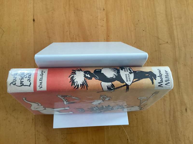 DARK BRIGHT LAND (first published 1955). Hardcover in a VG condition.