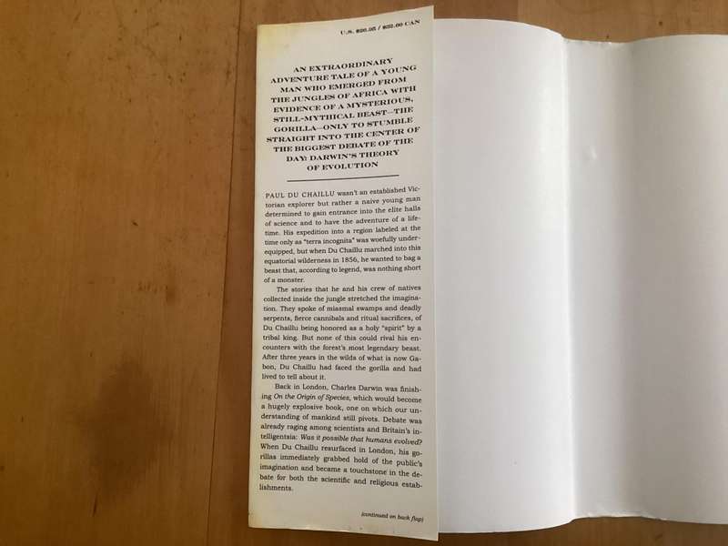 BETWEEN MAN and BEAST. True Story, by Monte Reel. Hardcover in a VG+ condition.