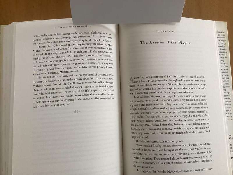 BETWEEN MAN and BEAST. True Story, by Monte Reel. Hardcover in a VG+ condition.