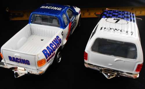 two die-cast model cars one price Ford Expedition  and Ford F50 both by Realtoy