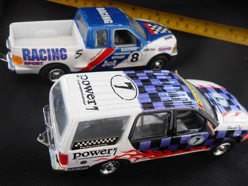 two die-cast model cars one price Ford Expedition  and Ford F50 both by Realtoy