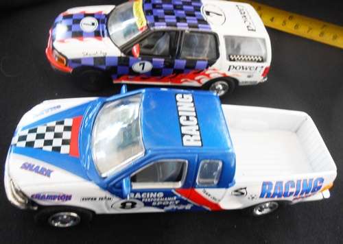two die-cast model cars one price Ford Expedition  and Ford F50 both by Realtoy