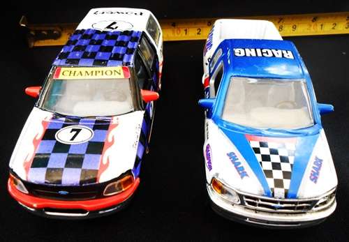 two die-cast model cars one price Ford Expedition  and Ford F50 both by Realtoy