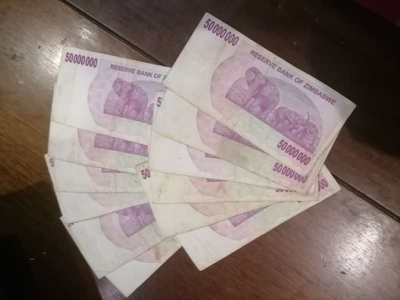 12 X 50 MILLION DOLLARS bearer Tjeks Zimbabwe