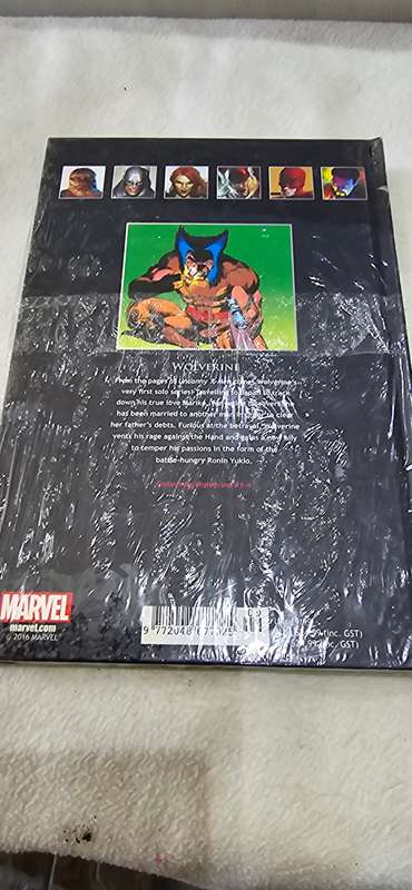 MARVEL SUPERHEROES HARDCOVER COMIC (WOLVERINE)