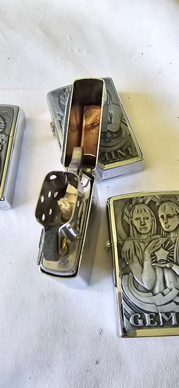 4 X HOROSCOPE CIGARETTE LIGHTERS(MAKES GREAT GIFTS)
