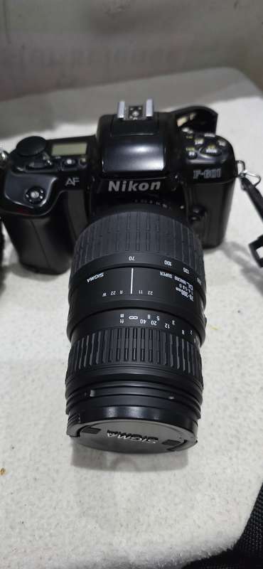 NIKON F601 CAMERA WITH LENS ,CASE AND A SPARE FILM ROLL