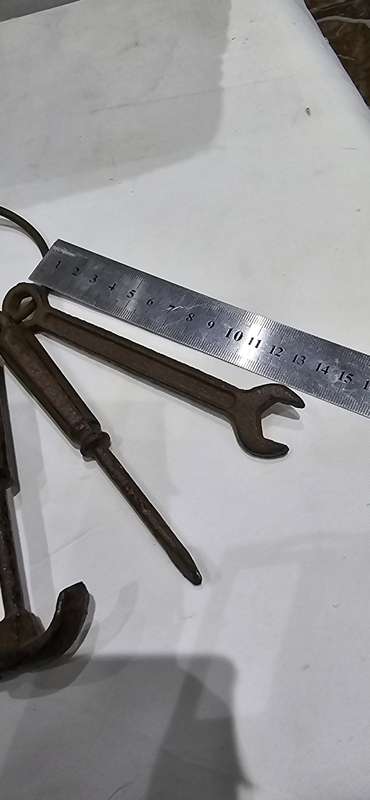 ANTIQUE RUSTIC TOOL SET CLAMPED IN A RING(DECORATIVE ITEM)