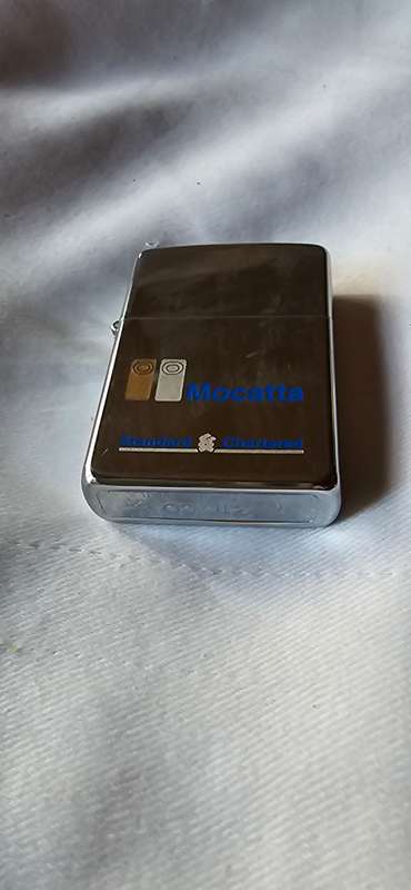 ZIPPO LIGHTER WITH MOCATTA STANDARD CHARTERED LOGI 1973