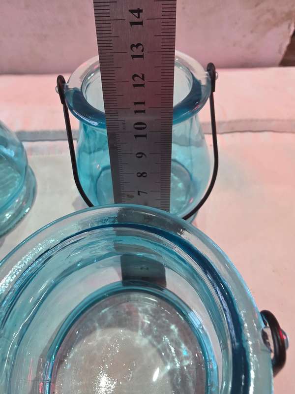 4 PIECE AQUA BLUE GLASS CANDLEHOLDES