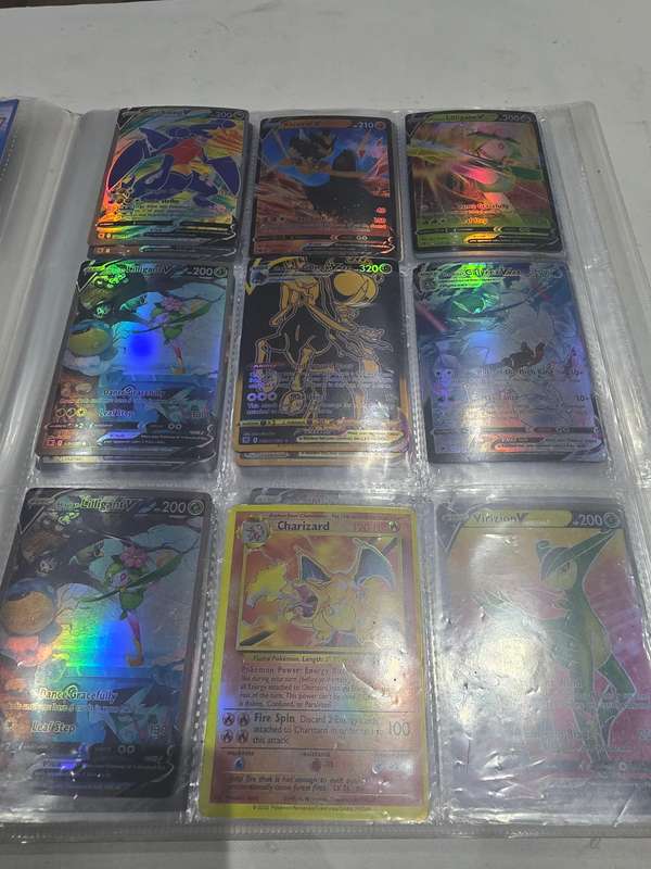 ALBUM OF 99 POKEMAN HOLOGRAM CARDS