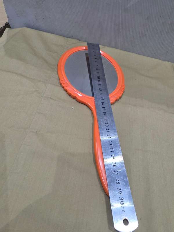 VINTAGE PLASTIC ORANGE VANITY HANDHELD MIRROR