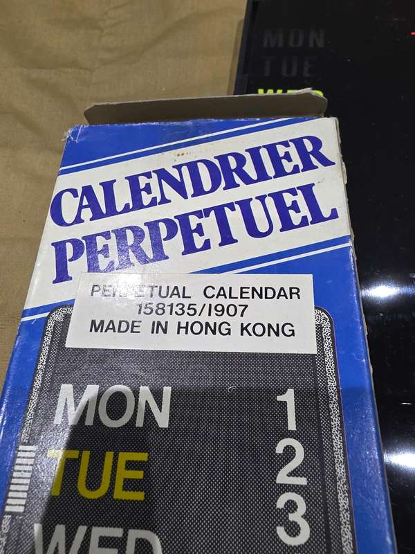 VINTAGE PERPETUAL CALENDAR (MADE IN HONG KONG ) WITH HIGHLIGHTS)