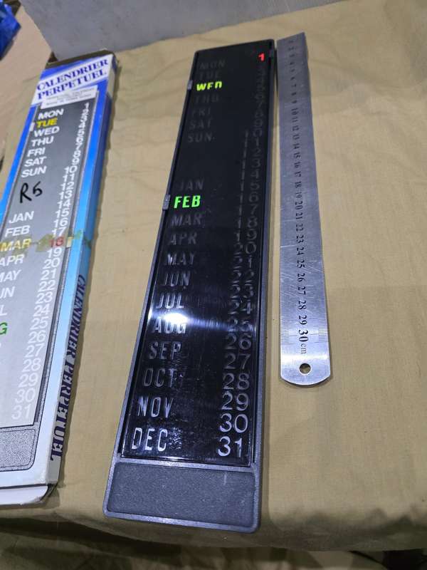 VINTAGE PERPETUAL CALENDAR (MADE IN HONG KONG ) WITH HIGHLIGHTS)