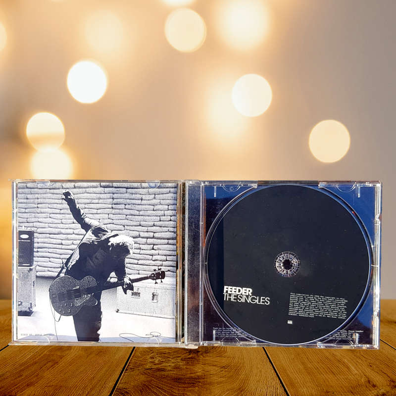 CD Feeder The Singles