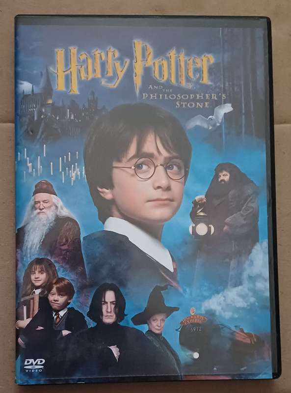 HARRY POTTER - AND THE PHOLOSOPHER'S STONE